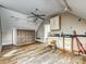 Cozy attic living space, with sleek hardwood floors, offering a unique and versatile room at 7811 Biddstone Ct, Charlotte, NC 28226