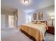Bright bedroom with carpet and a large bed at 805 Stack Rd, Monroe, NC 28112