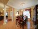 Formal dining room featuring decorative moldings, pillars, and an abundance of light at 805 Stack Rd, Monroe, NC 28112