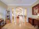 Elegant foyer featuring hardwood floors, pillars, and an open floor plan at 805 Stack Rd, Monroe, NC 28112