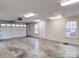 Spacious two-car garage featuring ample lighting, windows, and plenty of room for storage at 805 Stack Rd, Monroe, NC 28112
