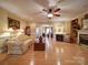 Spacious living room with fireplace, hardwood floors, and elegant architectural details at 805 Stack Rd, Monroe, NC 28112