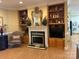 Cozy living room features a fireplace, built-in shelving, and beautiful mantelpiece decor at 805 Stack Rd, Monroe, NC 28112