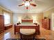 Spacious main bedroom with a ceiling fan, and hardwood floors at 805 Stack Rd, Monroe, NC 28112