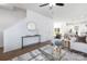 Bright living room featuring wood floors, stylish furniture, and an open concept layout at 8455 Old Plank Rd, Charlotte, NC 28216