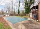 Backyard featuring a closed in-ground pool, shed and a seating area at 9524 Fairlane Dr, Charlotte, NC 28214