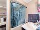 Bathroom with tub, shower, sink, vanity, and tiled flooring at 9524 Fairlane Dr, Charlotte, NC 28214