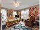 Bedroom with ceiling fan, TV, dresser, and outdoor view at 9524 Fairlane Dr, Charlotte, NC 28214
