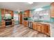 Bright kitchen featuring butcher block counter tops, stainless steel appliances, and modern cabinetry at 9524 Fairlane Dr, Charlotte, NC 28214