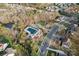 Aerial of community amenities including a pool, playground, and common areas at 1102 Less Traveled Trl, Indian Trail, NC 28079