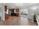 Spacious kitchen with wood cabinets, sliding glass door and stainless steel refrigerator at 1102 Less Traveled Trl, Indian Trail, NC 28079