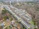 Aerial view of a residential neighborhood with townhouses at 128 Locomotive Ln # 110, Mooresville, NC 28115