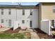 View of a townhouse backyard with patio at 128 Locomotive Ln # 110, Mooresville, NC 28115