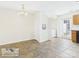 Bright dining space with tile floors and a modern light fixture at 128 Locomotive Ln # 110, Mooresville, NC 28115