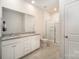 Bathroom features dual sinks with granite countertops and glass-enclosed shower at 14705 Superior St, Charlotte, NC 28273