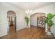 Spacious dining room with arched doorways and views into the adjacent kitchen at 14705 Superior St, Charlotte, NC 28273