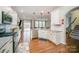 Modern kitchen with stainless steel appliances and a large center island at 14705 Superior St, Charlotte, NC 28273