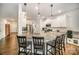 Open kitchen with granite countertops, stainless steel appliances and pendant lights at 14705 Superior St, Charlotte, NC 28273