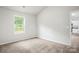 Neutral bedroom with carpeted floor, a bright window, and views of nature at 1568 Doran Ter, Richburg, SC 29729