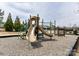 Fun community playground with slides, climbing structures, and a safe, soft ground surface, perfect for recreation and playdates at 15954 Harbor Hill Dr, Charlotte, NC 28273