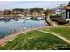 Stunning waterfront featuring landscaped pathways and docks, enhancing the community's appeal at 18783 Vineyard Point Ln, Cornelius, NC 28031