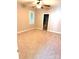 Empty bedroom with neutral carpet and a window with a shutter at 18845 Cloverstone Cir, Cornelius, NC 28031