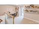 Upstairs open office space with a built in desk and carpet at 18845 Cloverstone Cir, Cornelius, NC 28031