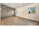 Bedroom featuring wood floors and paneled walls at 2530 31St Street Ne Dr, Hickory, NC 28601