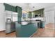 Close up of a stylish kitchen with stainless steel appliances, a center island, and custom cabinetry at 2530 31St Street Ne Dr, Hickory, NC 28601