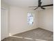 Bedroom with a large window and carpeted floor at 2868 Oasis Ln, Charlotte, NC 28214