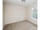 Bedroom with window and carpeted floor at 2868 Oasis Ln, Charlotte, NC 28214