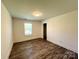 Clean room with modern vinyl flooring and natural light from the window at 324 Ashford St, Chester, SC 29706