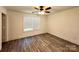 Cozy bedroom with luxury vinyl flooring and a window at 324 Ashford St, Chester, SC 29706