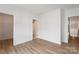 Neutral bedroom with wood-look flooring and ample closet space at 3413 Holabird Ln # 10, Charlotte, NC 28208