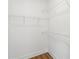 Walk-in closet with white wire shelving, providing ample storage space at 3413 Holabird Ln # 10, Charlotte, NC 28208