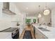 Open-concept kitchen flowing into the living area, creating a seamless living space at 3413 Holabird Ln # 10, Charlotte, NC 28208