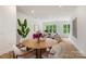 Bright living room with hardwood floors and plenty of natural light from large windows at 3413 Holabird Ln # 10, Charlotte, NC 28208