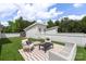Relaxing rooftop patio with outdoor seating and a manicured artificial lawn at 3413 Holabird Ln # 10, Charlotte, NC 28208