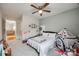 A bedroom with carpeted floors, a ceiling fan, and lots of toys at 423 Castlebury Ct, Clover, SC 29710