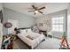 bedroom featuring carpeted floors, ceiling fan, and bright, playful decor at 423 Castlebury Ct, Clover, SC 29710