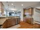 Well-lit kitchen with granite counters, stainless steel appliances, and hardwood flooring at 423 Castlebury Ct, Clover, SC 29710