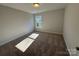 Neutral bedroom with carpet and natural light from a window at 4254 Black Ct # 170, Harrisburg, NC 28075