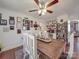 Cozy dining space with hardwood floors and built-in shelving, adjacent to a comfortable living area at 4450 Flowes Store Rd, Concord, NC 28025