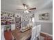 Bright dining room with white built-in shelves, decor and a wooden table centerpiece with seasonal decor at 4450 Flowes Store Rd, Concord, NC 28025