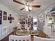 Bright dining room with white built-in shelves, decor and a wooden table centerpiece with seasonal decor at 4450 Flowes Store Rd, Concord, NC 28025