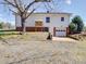View of the back of a two-story home featuring a garage at 4450 Flowes Store Rd, Concord, NC 28025