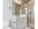 Contemporary bathroom with a sleek vanity, modern fixtures, and a glass-enclosed shower at 5003 Tiny Ln, Charlotte, NC 28203