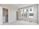 Light-filled bedroom featuring a closet with built-in shelving and a bright window at 5003 Tiny Ln, Charlotte, NC 28203