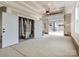 View of the spacious garage with unfinished walls and visible garage door hardware at 5003 Tiny Ln, Charlotte, NC 28203