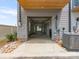 View of the garage with unfinished interior and well-maintained exterior at 5003 Tiny Ln, Charlotte, NC 28203